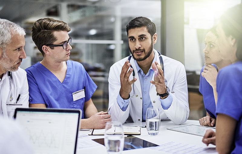 Medical professionals debating